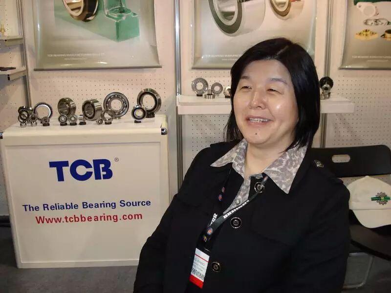 Wang Bing at a TCB exhibition booth Wang Bing at a TCB exhibition booth